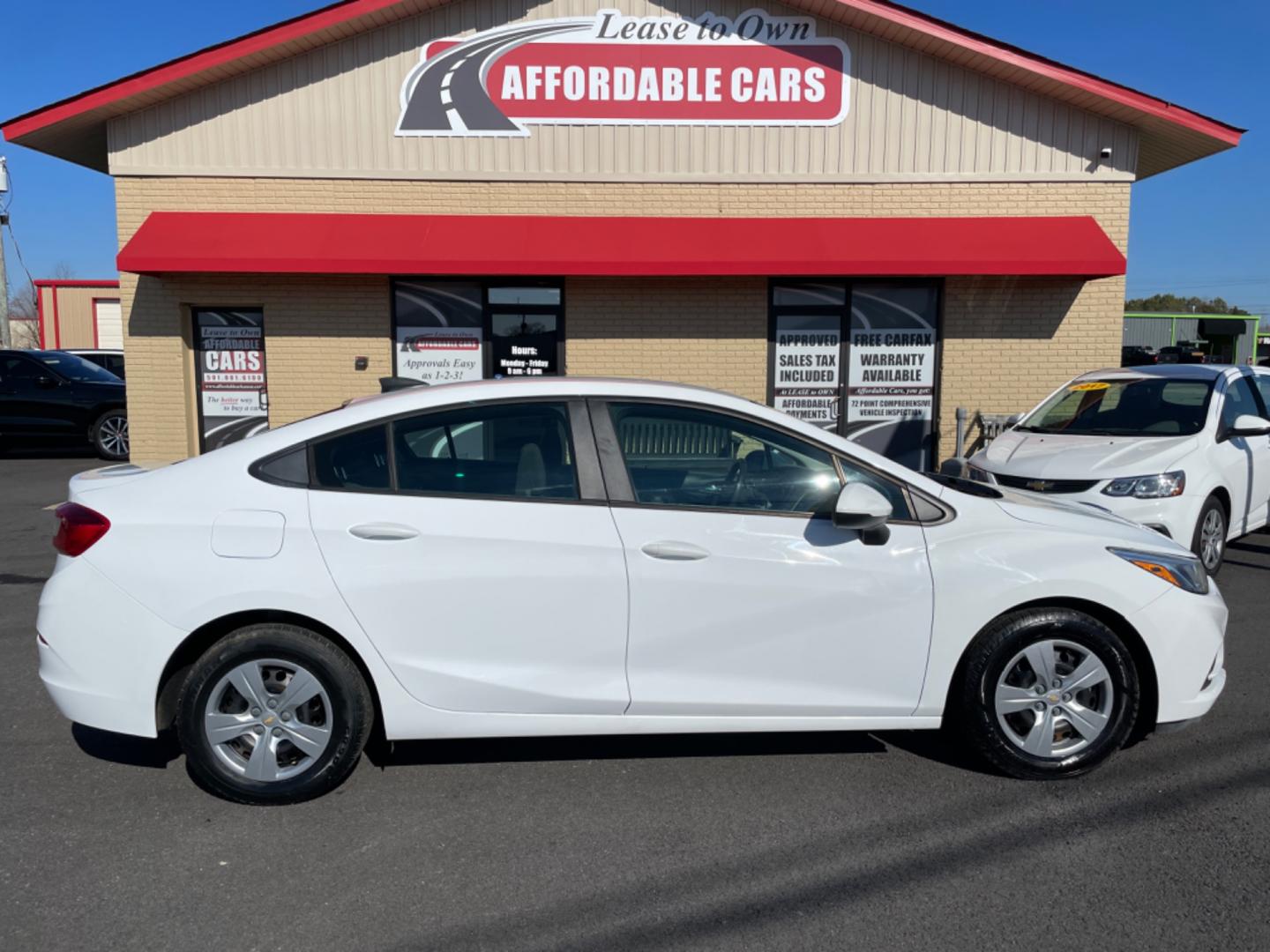 2017 White Chevrolet Cruze (1G1BC5SM0H7) with an 4-Cyl, Turbo, 1.4 Liter engine, Automatic, 6-Spd transmission, located at 8008 Warden Rd, Sherwood, AR, 72120, (501) 801-6100, 34.830078, -92.186684 - Photo#0